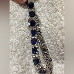 Simulated Sapphire jewel Silver bracket.